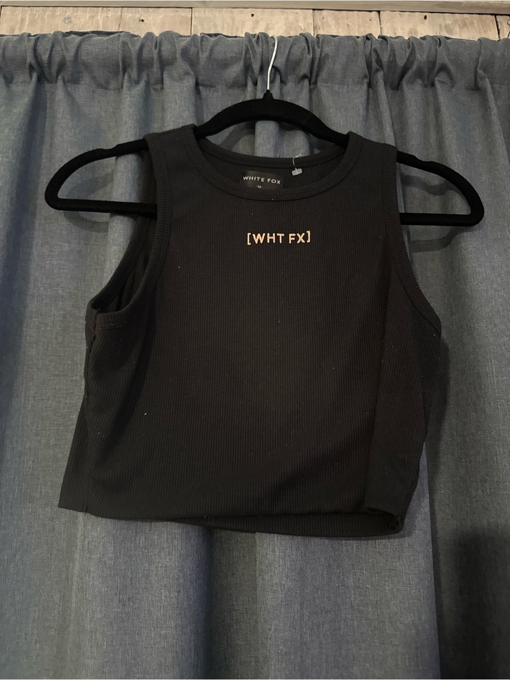 White Fox Ribbed Cropped Tank Top
Size Medium
